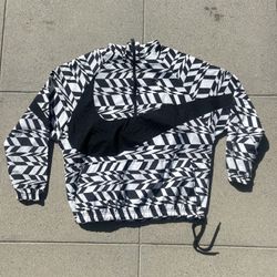 Nike AOP Swoosh Woven Half Zip Anorak Black White Jacket/Fanny Pack Fold Up. This is a cool piece/jacket that folds into a bag/fanny pack, so you can 