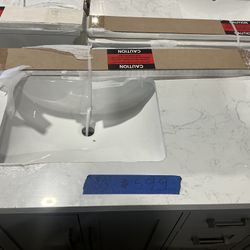 36” Bathroom Vanity in grey , single sink soft close solid wood with vanity top in white  $599  Luke’s liquidations warehouse Address:  2434 N Forsyth