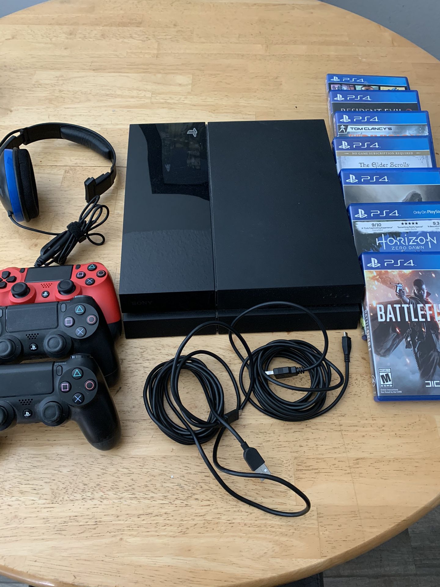 PS4 w/ games, headset, and controllers