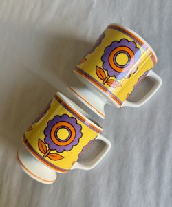 Two Vintage 6-oz 70’s Flower Power Stacking Pedestal Mugs