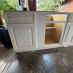 Cream Kitchen Base Cabinets with Raised Panel Doors