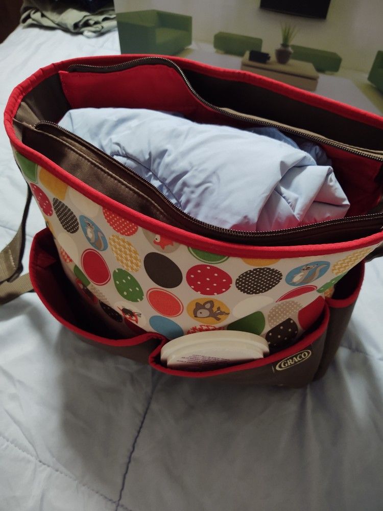 Girl Dog Baby Bag.  Has Jackets And Toys.