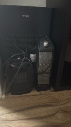 2 small portable heaters