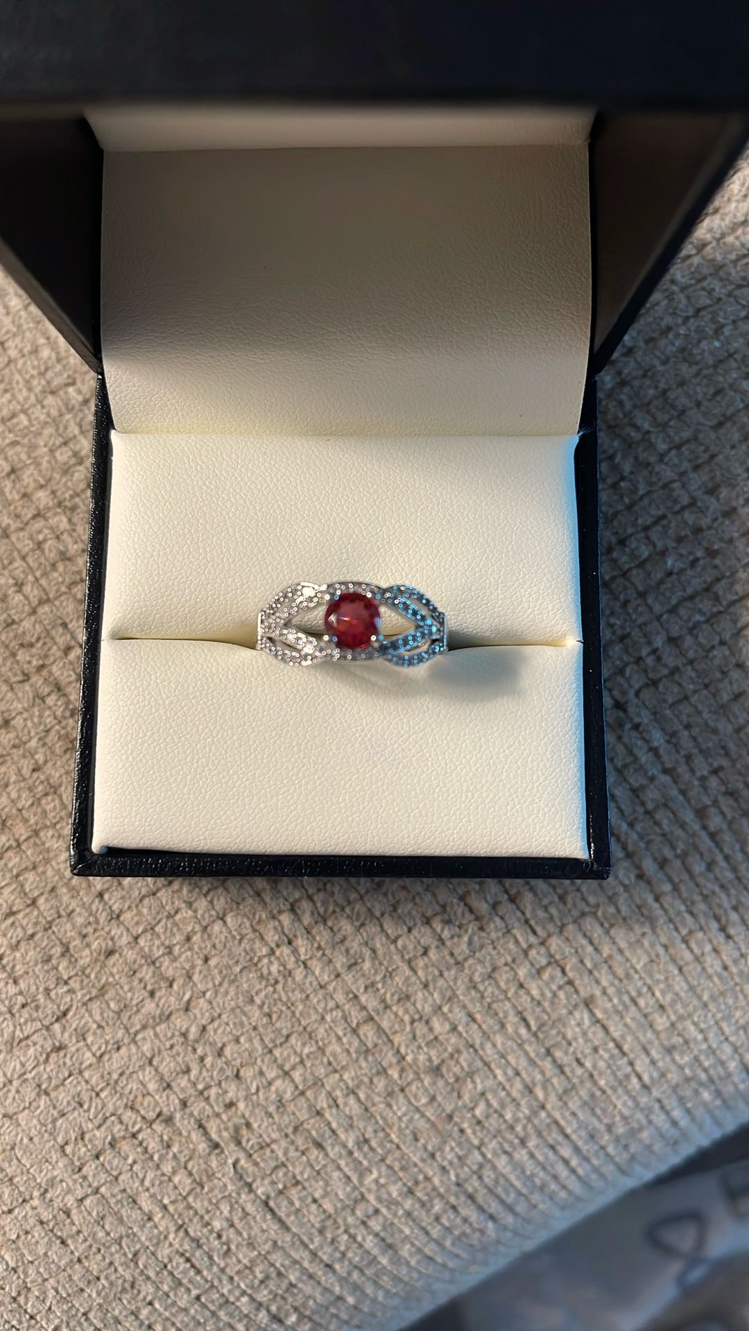 Sterling silver garnet ring with accents