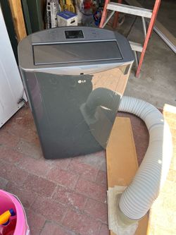 Portable air conditioner with window hose