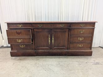 Traditional Dark Wood Buffet with Ornate Hardware