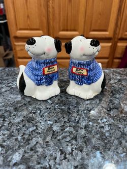 Ceramic Blue Sky Dogs Wearing Blue Sweaters “Bow Wow “ Pair of Salt and Pepper Shakers. Size approximately 3 1/2 inches tall. Brand new never used s