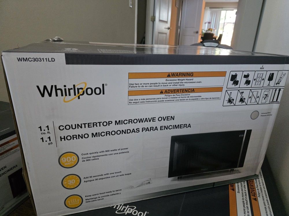 Whirlpool 1.1-cu ft Medium 900 -Watt Sensor Cooking Controls Countertop Microwave