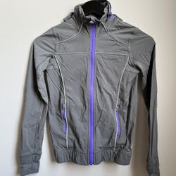 Ivivva girl’s hooded jacket with reflective strips size 10