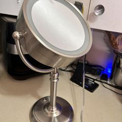 Light up makeup vanity mirror one side is regular other is magnifying 