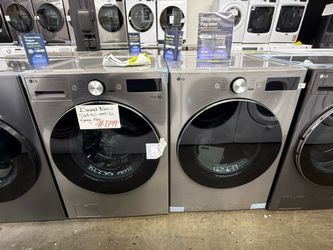 New open box LG Stainless steel front load washer and gas dryer set