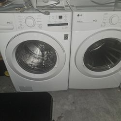 LG White front load Washer and Dryer set. See details all included.