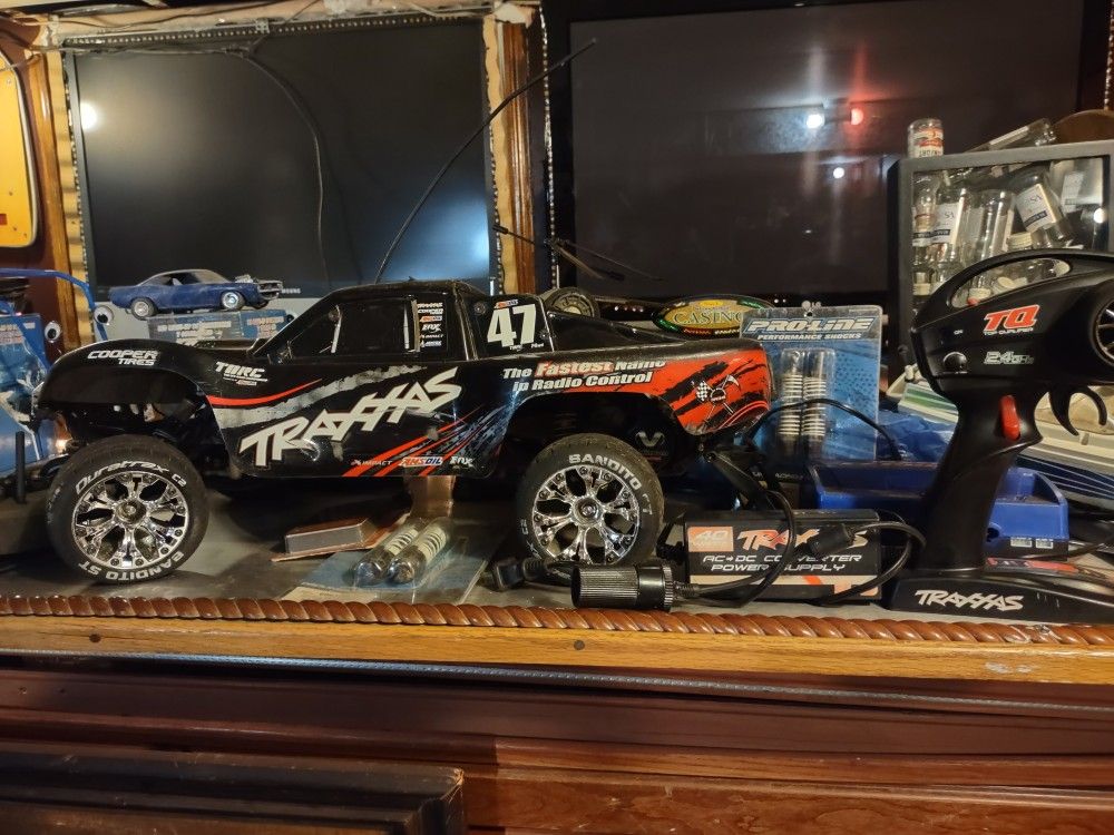 Traxxas Slash 2wd Lots Of Upgrades Has Engine Sound Box Under Body Light's Headlights NEW Wheels And Tire's FAST Truck Extra Shocks $300 OR Trade For 