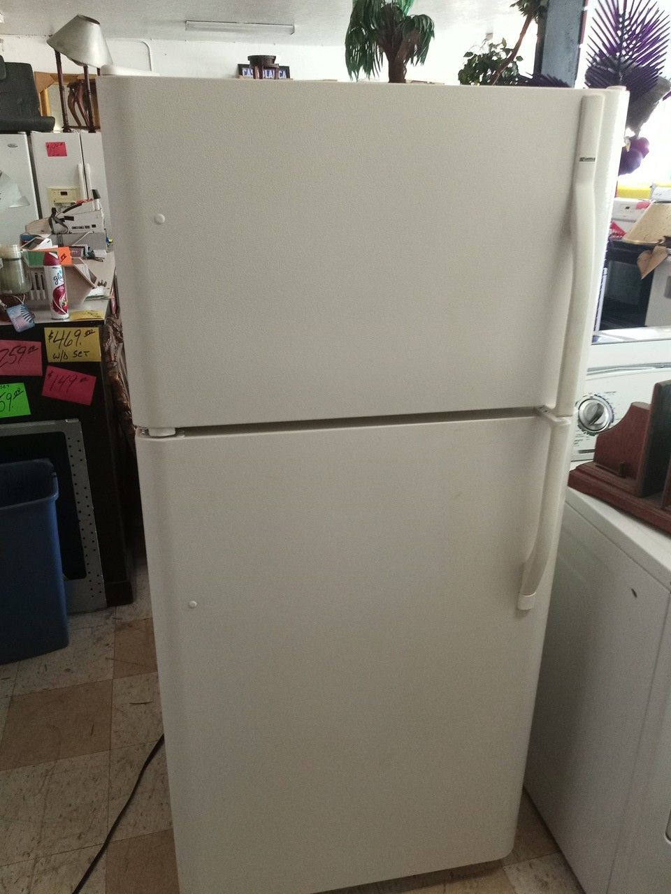 Kenmore refrigerator 30" off white works great nice . Warranty . Delivery available . 2203 Fowler st. Ft. Myers 33901