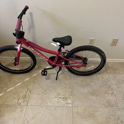 Hot pink Specialized Riprock Coaster 20 kids' bicycle