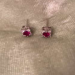 Ruby, Earrings In sterling with four diamonds