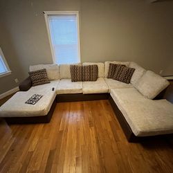 tan/brown sectional couch. larger size with coffee table storage 