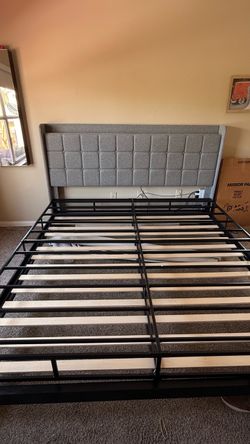 Bed frame with headboard