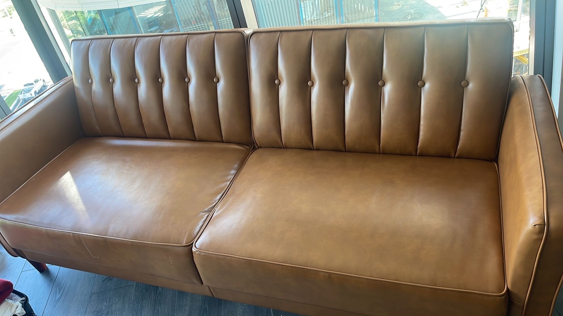 Convertible faux leather couch