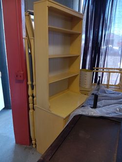 Hello customer I have a beautiful bookshelf brand new and a half four big drawers
