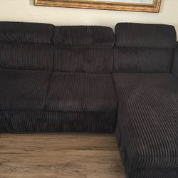 Black Sofa/ Into a Bed As Well / Charging / Cup Holder 