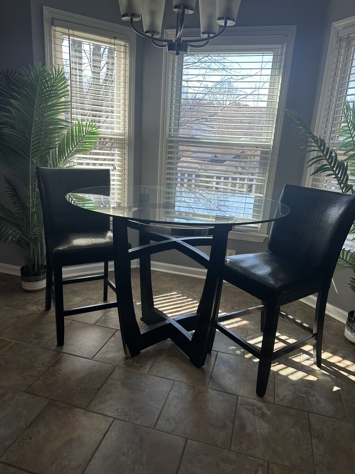 Black glass top breakfast table