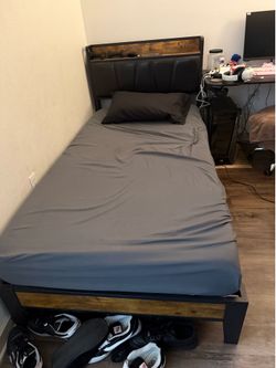 Twin bed frame with headrest