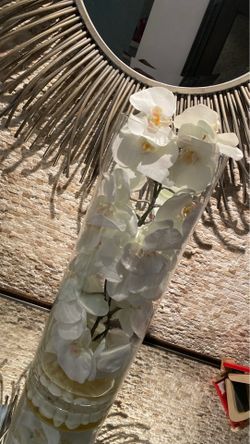 Vase with artificial flowers