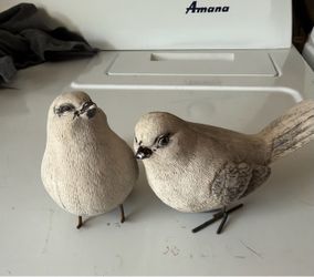 Pair of small garden or tabletop birds statues