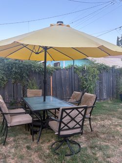 200 table for outside and umbrella