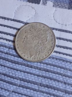 1884 MORGAN SILVER DOLLAR CC