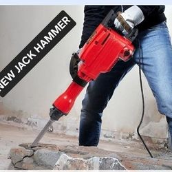 NEW JACK HAMMER WITH CASE  2 CHISELS INCLUDED
