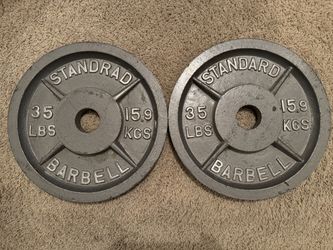 2- 35lbs steel Olympic plates