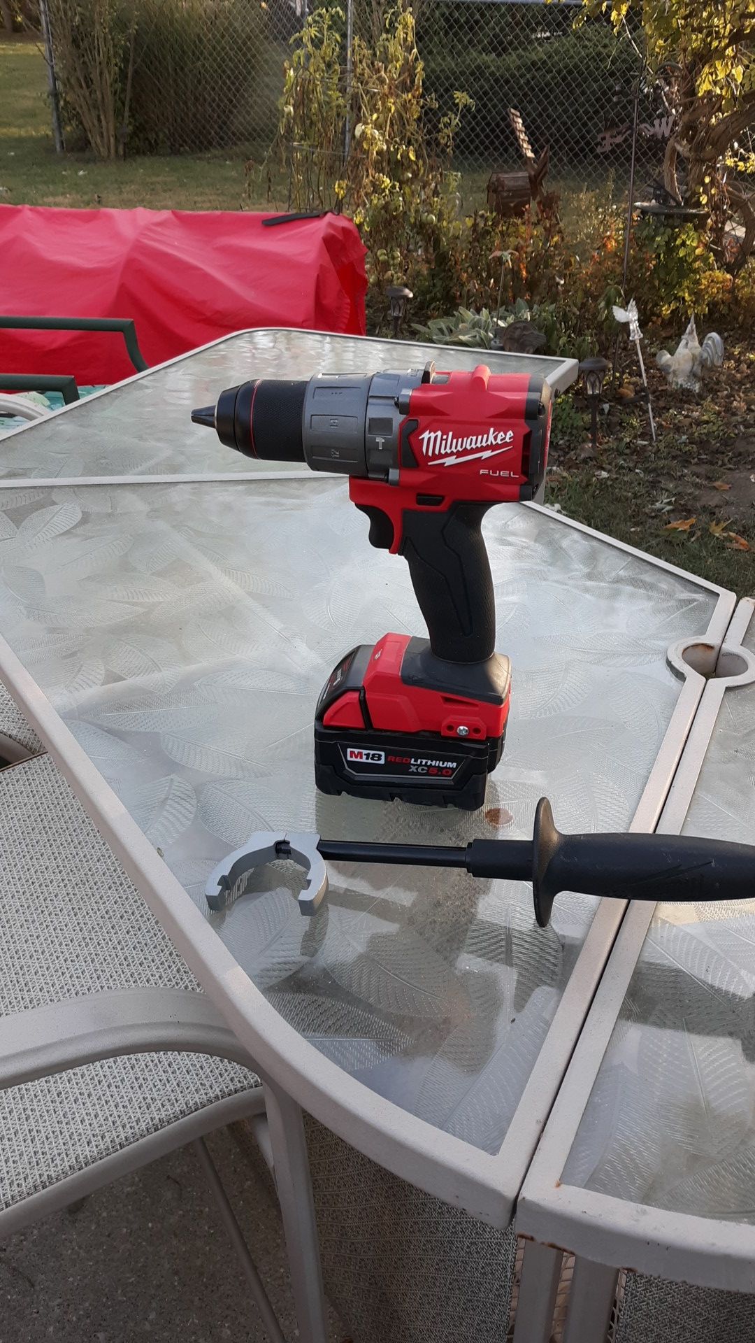 Brand new Milwaukee fuel hammer drill and 5 O battery