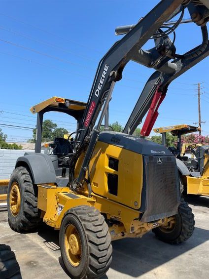 John Deere Skip loader 210 LEP