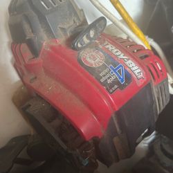 Troy-Bilt string trimmer.  I HAVE FOUR 4CYCLE  gas-powered weed eater