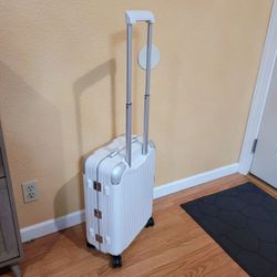  Rimowa  White 4-wheels Suitcase. Size 22×15×8