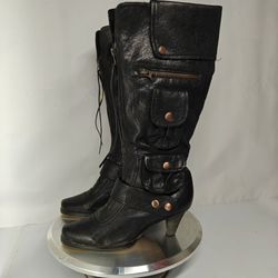 Size 6 US Women's Seychelles black  knee-high boots featuring cargo pockets, copper-toned