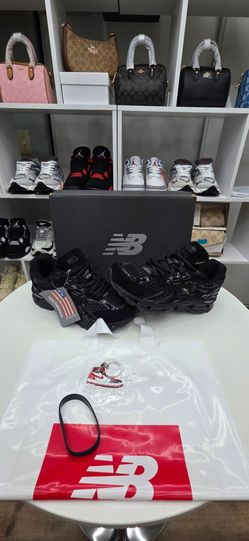New Balance 1954R Black 7.5 men 9 Women’s