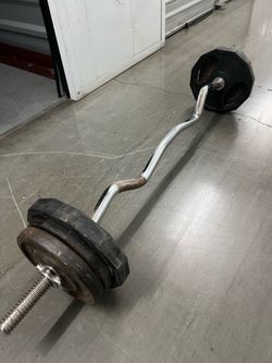 Curl bar 50 pounds in plates plus bar