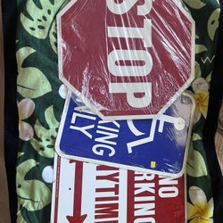 Stop sign, Handicap sign, and No parking sign 