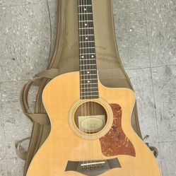 Taylor Guitars 214ce Model Acoustic Hollow Body Guitar Mahogany Brown Color Musical Instrument Music Audio Sound Live Concert Performance 