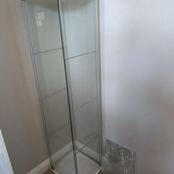 Two ikea Detolf Display Cabinets