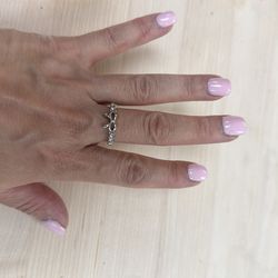 Silver plated bow 1/2 diamond ring size 6