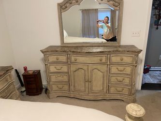 4 piece bedroom set. One night stand, long dresser and a chest with a quenn size bed frame