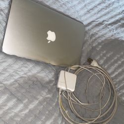 2015 11-inch MacBook (macOS Sierra) With Charger 