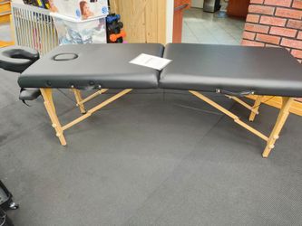 Massage table
