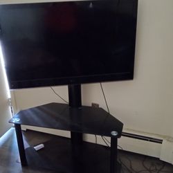 40in TV. And TV Stand 