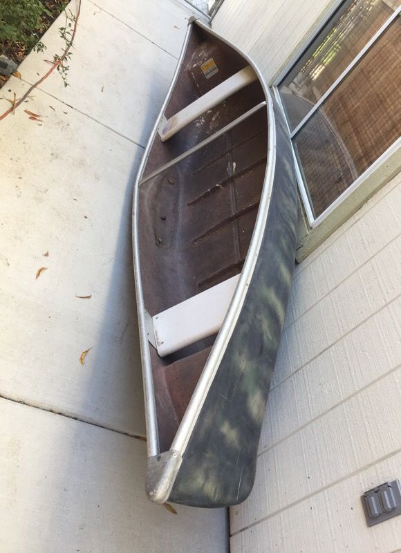 12 foot fiberglass canoe made by Sears and Roebuck’s