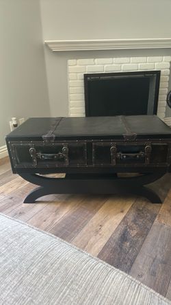 Brown leather coffee table